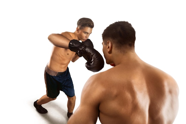 Boxers man fighting in ring