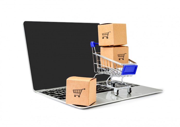 Photo boxes in a trolley on a laptop