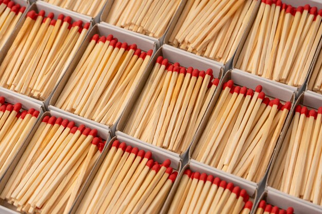 Boxes with new matchsticks as a background Top view