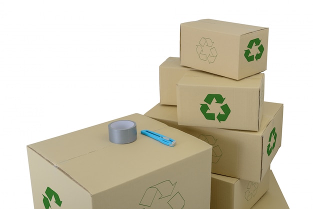 Boxes with Recycle Sign in different sizes stacked boxes isolated on white