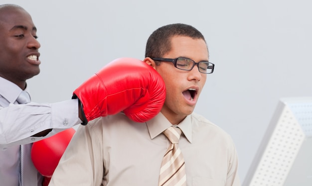 Boxing a businessman in the office