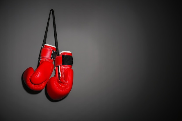 Boxing gloves on gray background