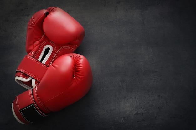 Boxing gloves on gray background