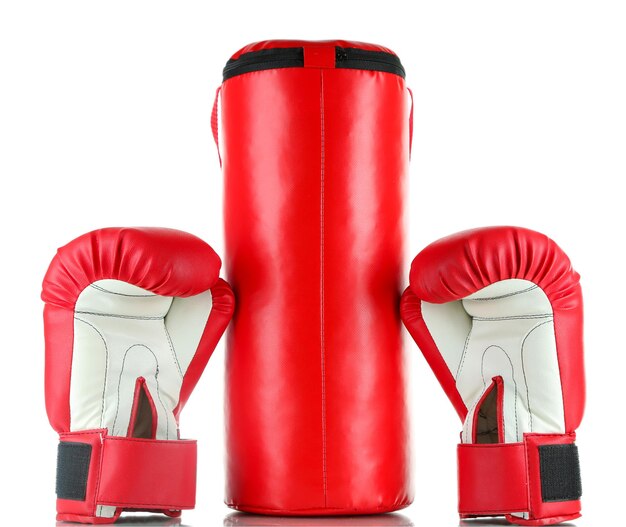 Premium Photo Boxing gloves and punching bag isolated on white