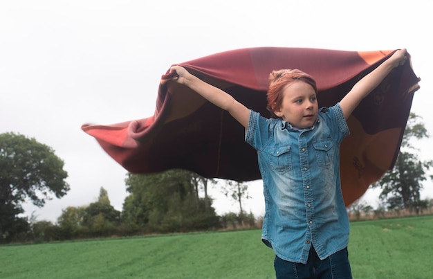 Boy 9 years old in the field