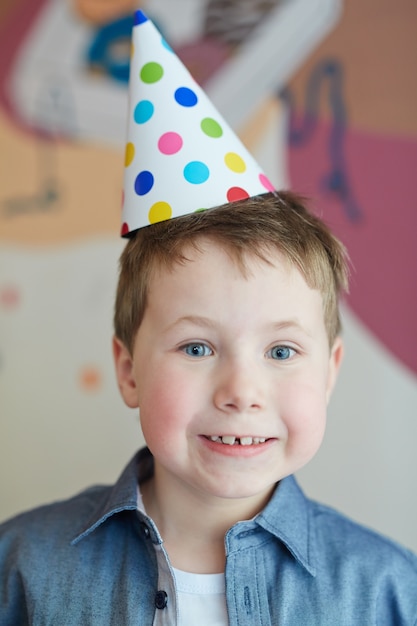 Boy in birthday-cap