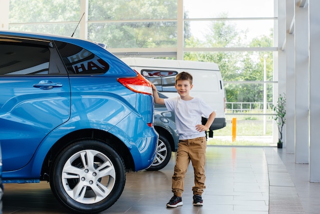 boy at the car dealership