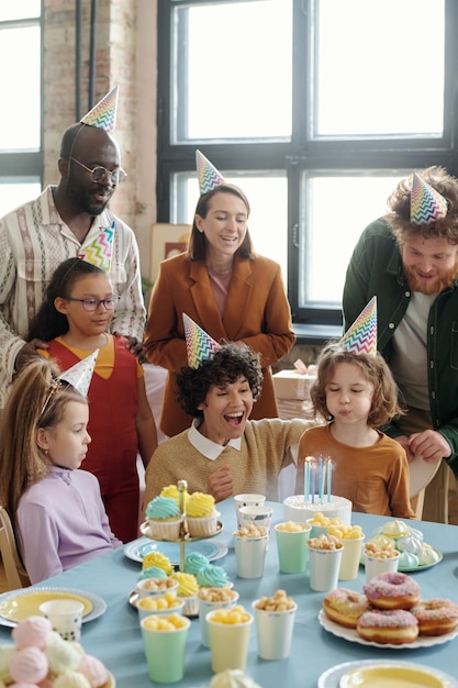 Boy celebrating birthday with friends