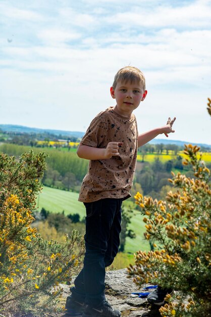 Boy of eight years in nature in spring