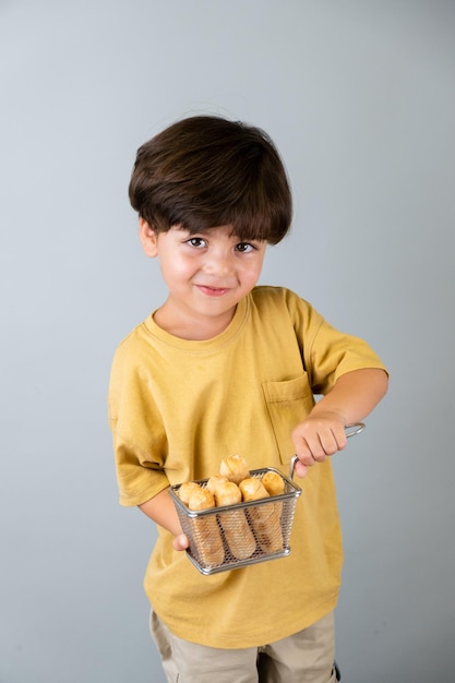 Boy enjoying tequenos Venezuelan appetizer