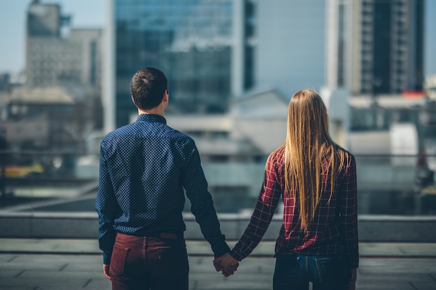 Boy and girl holding hands