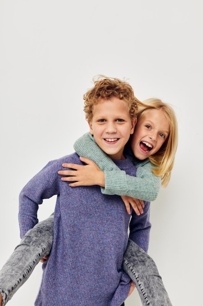 Boy and girl hug entertainment posing friendship childhood unaltered