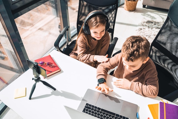 Boy and girl at laptop