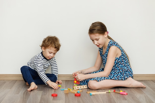 Boy and girl playing. Stay home concept, Coronavirus Covid-19 quarantine