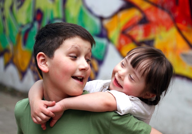 Boy and girl together on the playground.