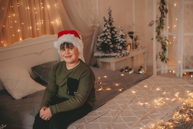 boy having fun in christmas decorations