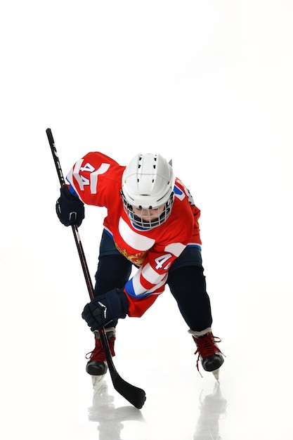 Photo boy hockey player in studio silhouette isolated on white background