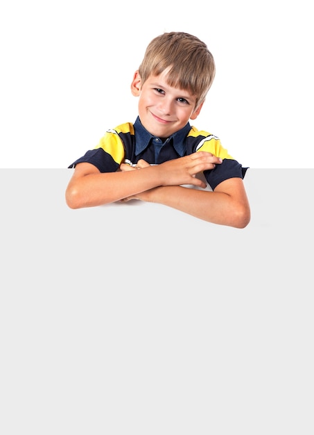 Boy holding a banner isolated on white background