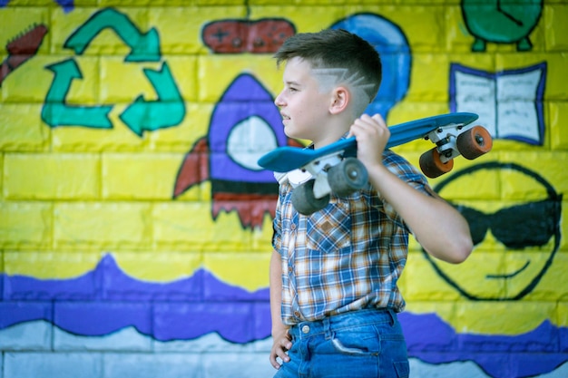 Photo boy holding a penny board photo