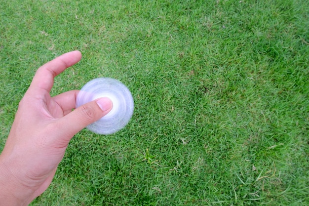 Boy holding play fidget spinners