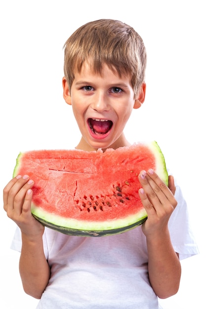 Boy is eating a watermelon