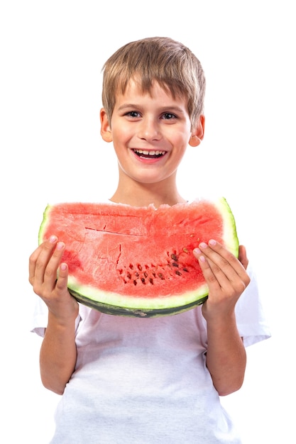 Boy is eating a watermelon