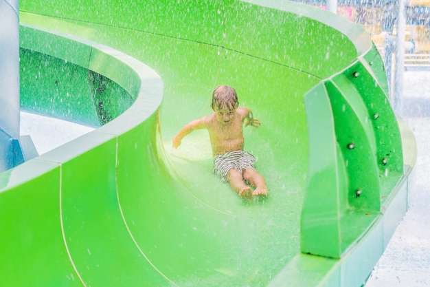 Boy is having fun in the water park