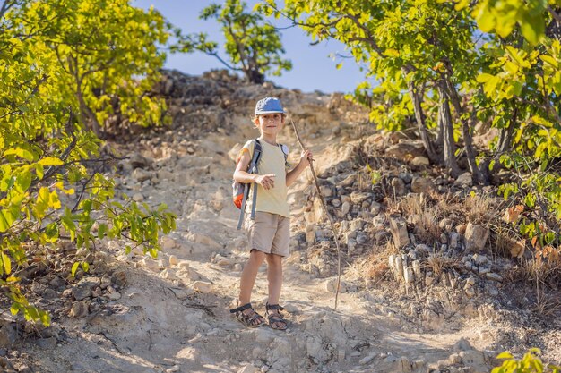 Boy local tourist goes on a local hike during quarantine covid 19