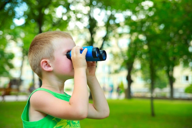 Boy looking through Binoculars