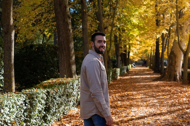 Boy in a park on an autumn day