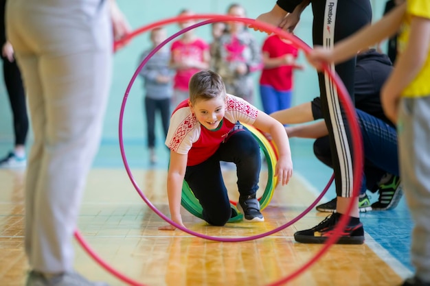 The boy participate in a sports day Children's relay Primary school students are competing