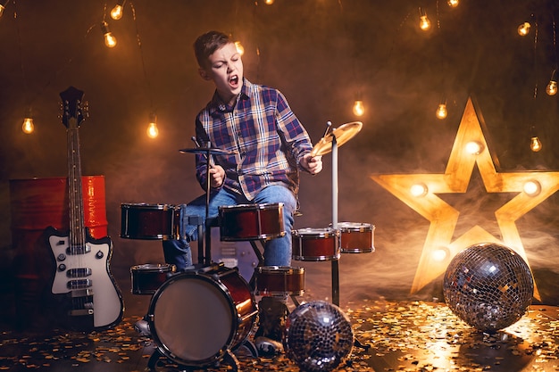 Boy playing the drums