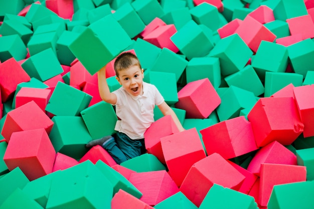 Boy playing in a dry pool