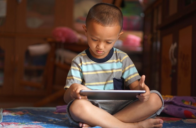 Boy playing games on computer