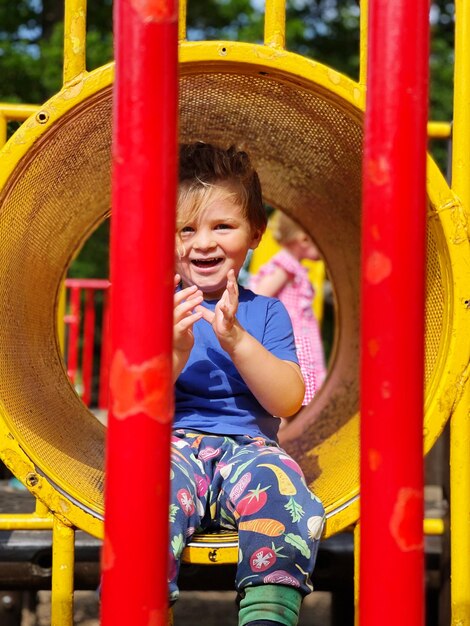 Boy playing in playground