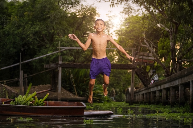 Boy playing in the river