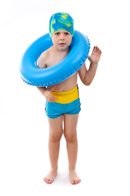 Boy playing with blue life ring