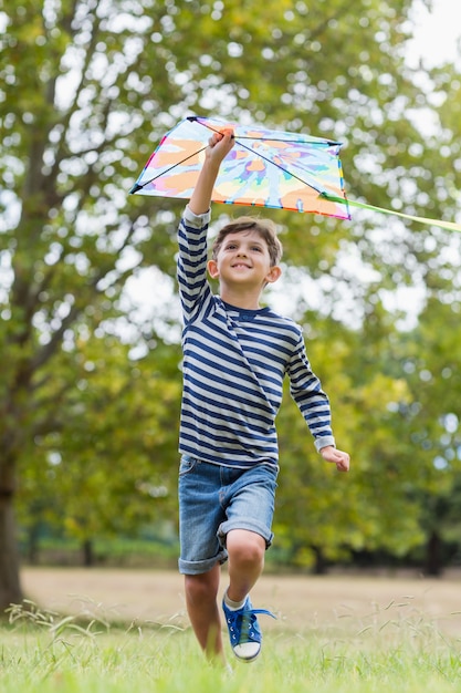 Boy playing with kite