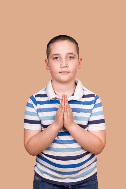 boy praying in the morning