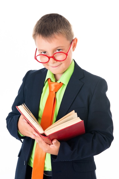 Boy reading a book thirsty for knowledge  isolated 