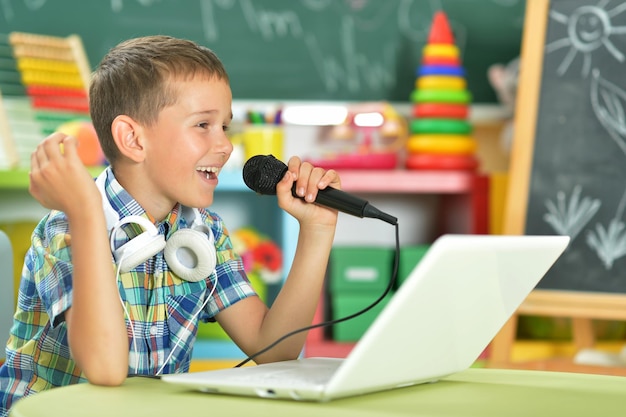 Boy singing karaoke