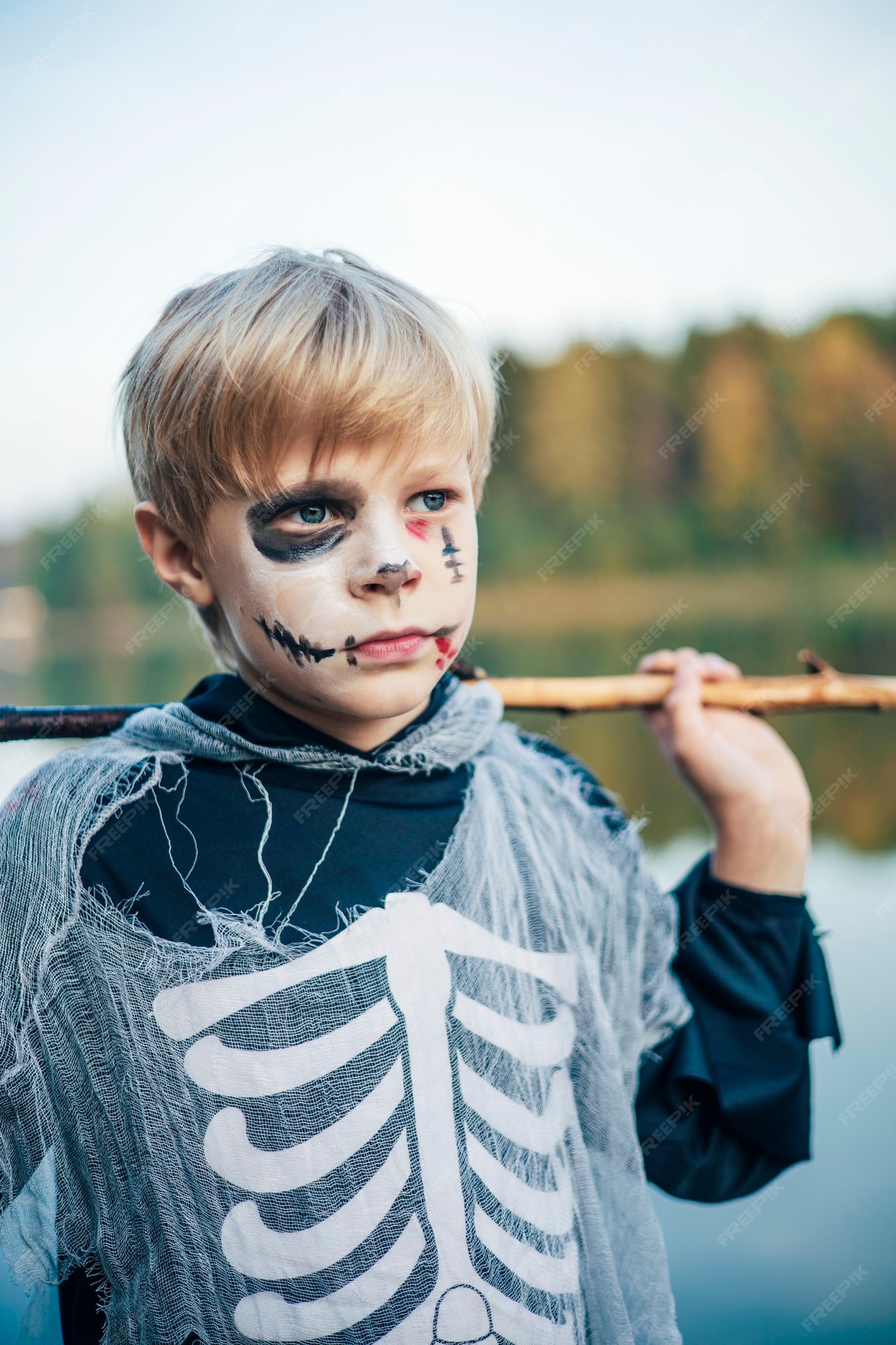 Premium Photo  A boy in a skeleton costume for halloween