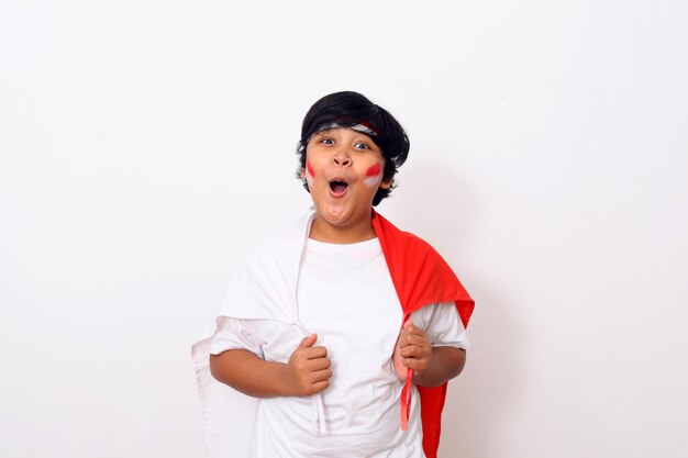 Photo boy standing against white background