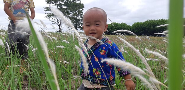 Boy standing on field