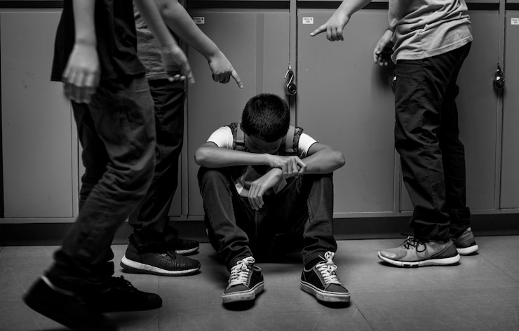 Photo boy student getting bullied in school