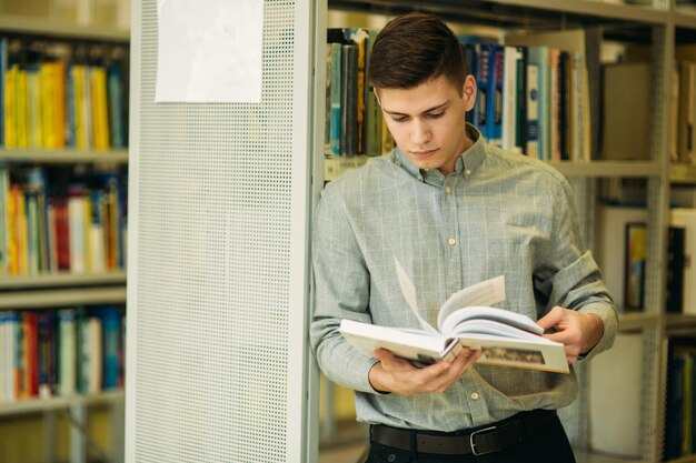 Boy student in library want to find some book