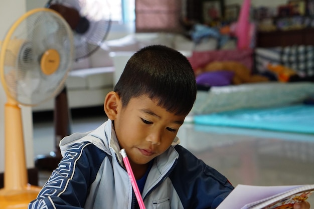 boy studying at home