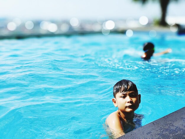 Boy swimming in a hotel in palembang