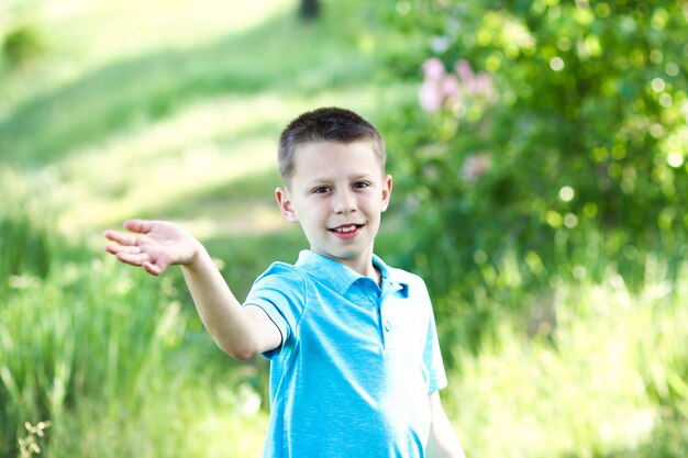 Boy walking in nature in the park