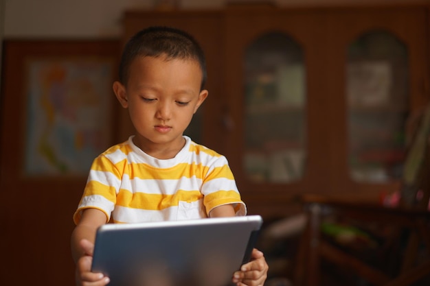 Boy watching video on computer